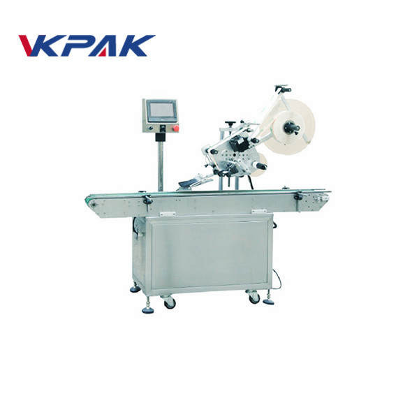 冰磚頂面不干膠貼標機